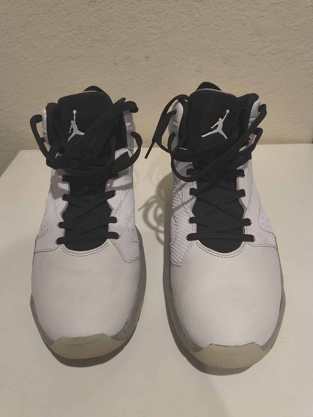 Jordan Men’s White and Black High-Top Sneakers